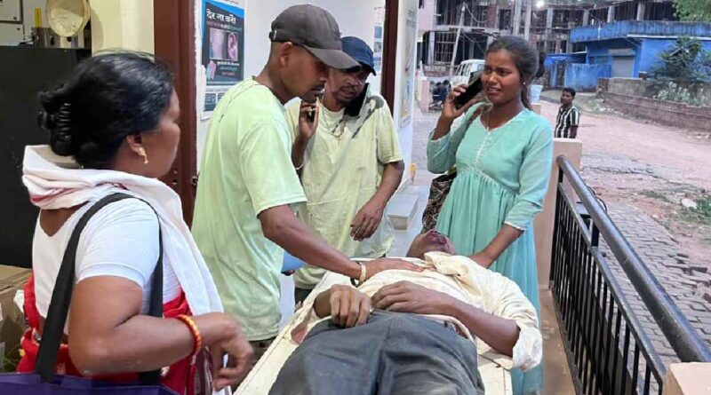 Relatives carrying the body
