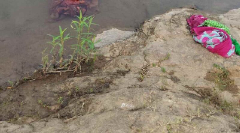 Woman dies after drowning in river